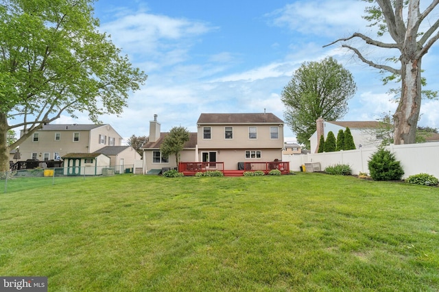 14 Yorkshire Rd, Hamilton, NJ 08610 - back of house with a chimney and a wooden deck