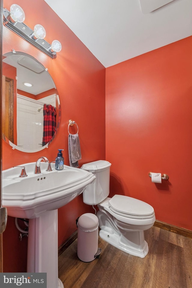 14 Yorkshire Rd, Hamilton, NJ 08610 - bathroom featuring toilet, wood finished floors, curtained shower, baseboards, and a sink