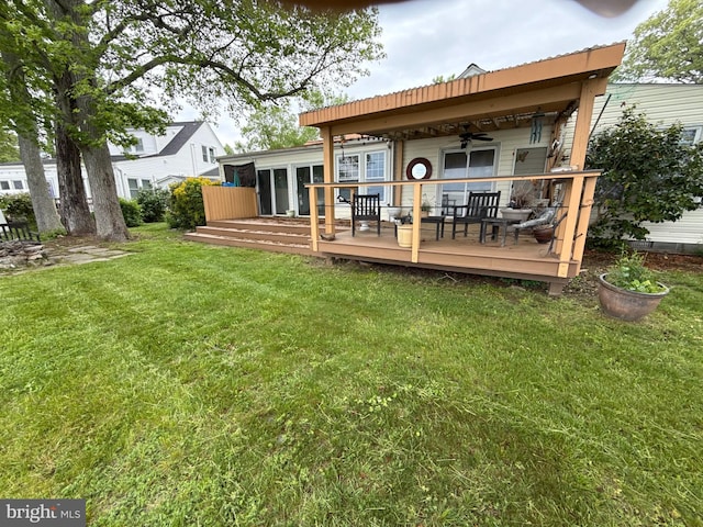 5227 Al Jones Dr, Shady Side, MD 20764 - back of house with a ceiling fan, a wooden deck, and a yard
