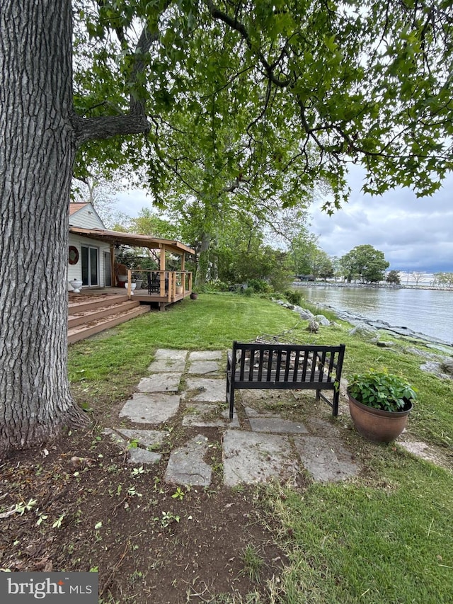 5227 Al Jones Dr, Shady Side, MD 20764 - view of green lawn featuring a deck with water view