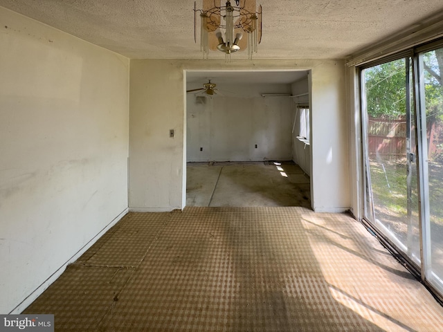 1228 Pacific Ave, Bristol, PA 19007 - unfurnished dining area with a textured ceiling