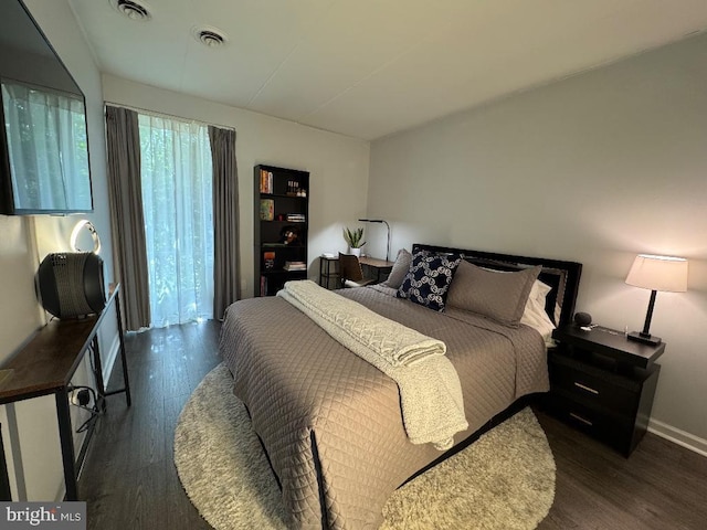 2622 Wagon Dr Unit 319, Alexandria, VA 22303 - bedroom featuring dark wood-type flooring and baseboards
