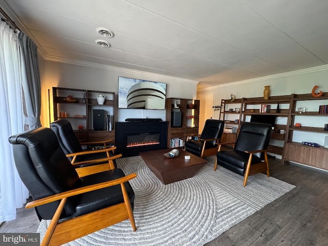 2622 Wagon Dr Unit 319, Alexandria, VA 22303 - living area featuring crown molding, wood finished floors, and a glass covered fireplace