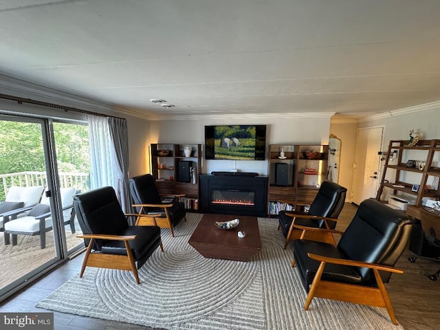 2622 Wagon Dr Unit 319, Alexandria, VA 22303 - living area featuring crown molding and a glass covered fireplace