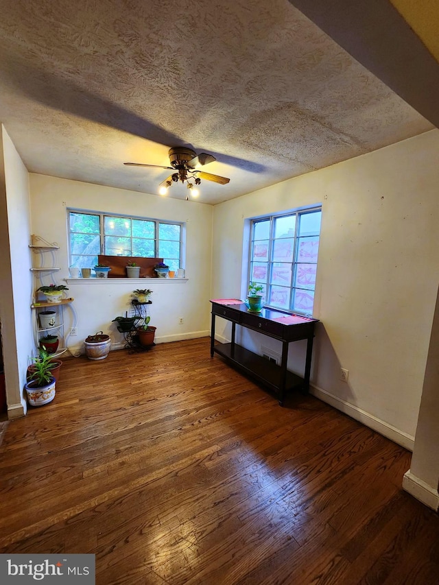 6029 Amherst Ave, Springfield, VA 22150 - unfurnished room featuring wood finished floors, baseboards, a textured ceiling, and ceiling fan