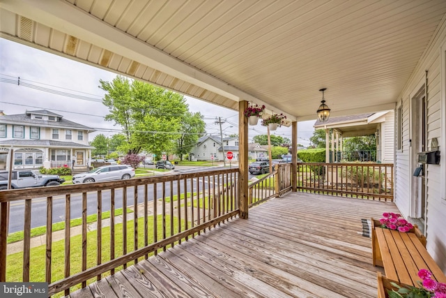 122 E Pine St, Audubon, NJ 08106 - wooden porch with a yard