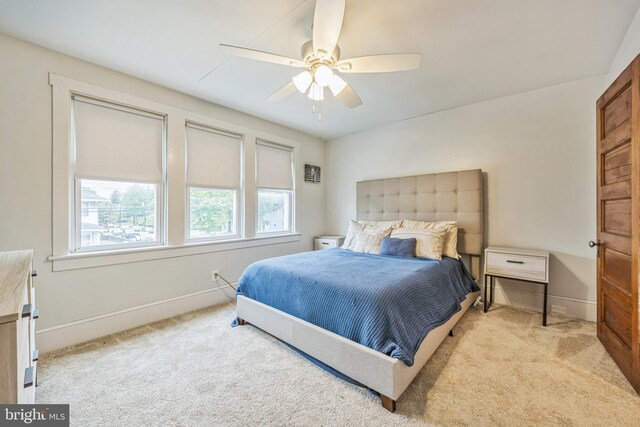 122 E Pine St, Audubon, NJ 08106 - bedroom with carpet flooring, baseboards, and a ceiling fan