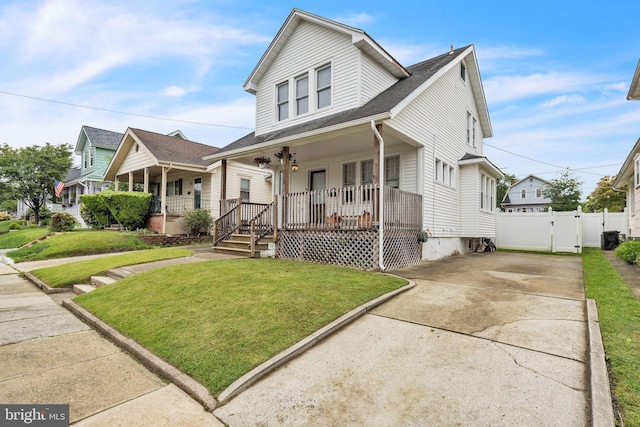 122 E Pine St, Audubon, NJ 08106 - view of front of property featuring covered porch, a gate, concrete driveway, and a shingled roof