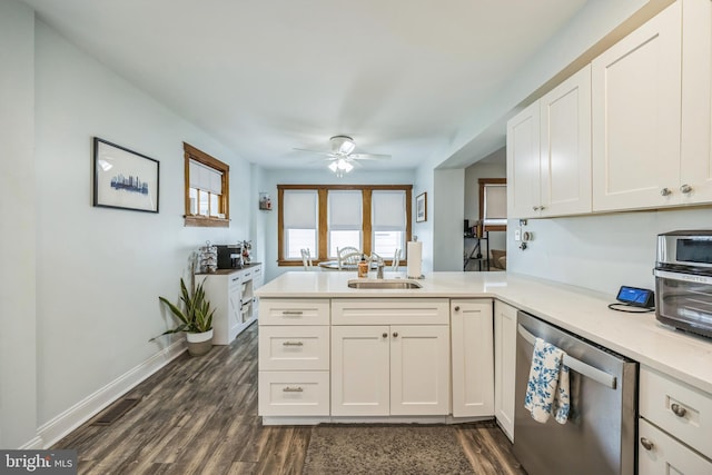 122 E Pine St, Audubon, NJ 08106 - kitchen featuring dishwasher, a sink, a ceiling fan, a peninsula, and light countertops