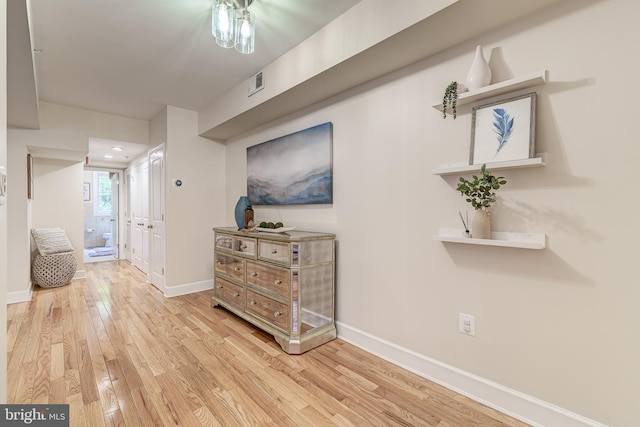 1858 California St NW Unit 20, Washington, DC 20009 - corridor featuring baseboards and light wood finished floors