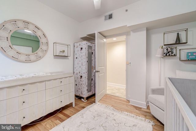 1858 California St NW Unit 20, Washington, DC 20009 - bathroom featuring wood finished floors, vanity, baseboards, and curtained shower