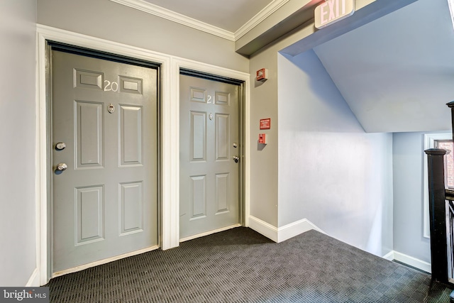 1858 California St NW Unit 20, Washington, DC 20009 - entryway featuring dark colored carpet, baseboards, crown molding, and lofted ceiling