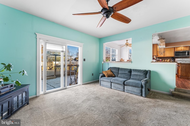 1 Winterberry Pl, Clayton, NJ 08312 - carpeted living room featuring healthy amount of natural light, ceiling fan, and baseboards