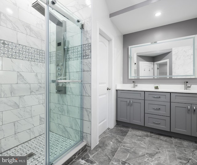 3908 Baltimore St, Baltimore, MD 21227 - bathroom with a shower stall, double vanity, marble look tiles, and recessed lighting