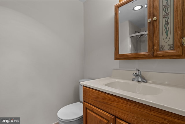 45104 Delaire Landing Rd Unit 104, Philadelphia, PA 19114 - bathroom featuring toilet, vanity, and a shower with shower door