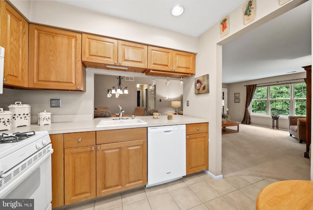 605A Ralston Dr Unit A, Mount Laurel, NJ 08054 - kitchen featuring white appliances, a sink, light countertops, and light tile patterned floors