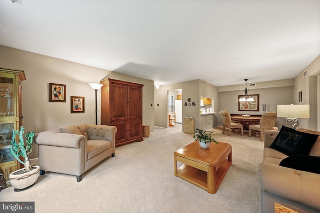 605A Ralston Dr Unit A, Mount Laurel, NJ 08054 - living area with a chandelier and light colored carpet