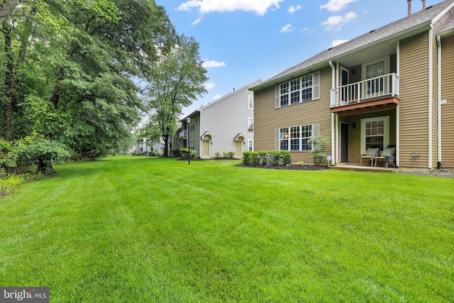 605A Ralston Dr Unit A, Mount Laurel, NJ 08054 - view of grassy yard featuring a balcony