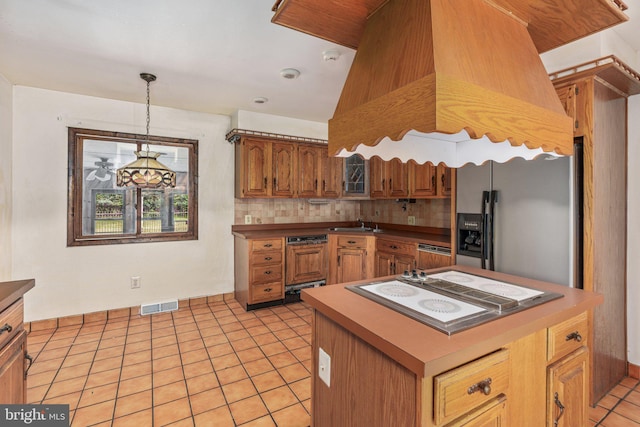 1685 E Willow Grove Ave, Glenside, PA 19038 - kitchen with fridge with ice dispenser, white electric cooktop, light tile patterned floors, backsplash, and pendant lighting