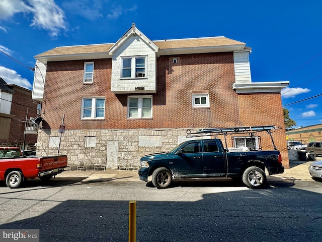 1318 E Luzerne St, Philadelphia, PA 19124 - view of front of home with stone siding and brick siding