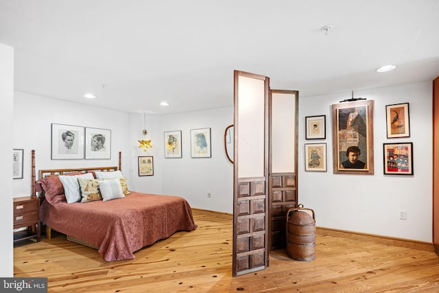 3132 E Thompson St Unit 2C, Philadelphia, PA 19134 - bedroom with light wood finished floors, recessed lighting, and baseboards