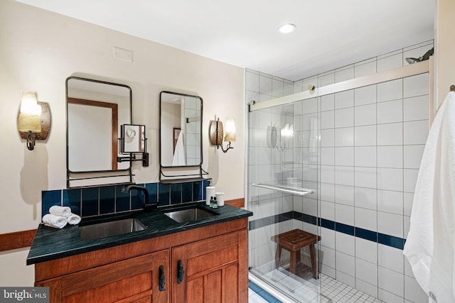 3132 E Thompson St Unit 2C, Philadelphia, PA 19134 - bathroom featuring a shower stall, double vanity, and recessed lighting