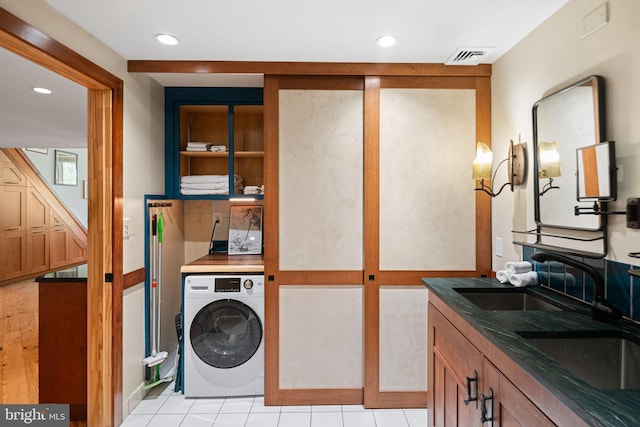 3132 E Thompson St Unit 2C, Philadelphia, PA 19134 - washroom featuring washer / clothes dryer, recessed lighting, and light tile patterned floors