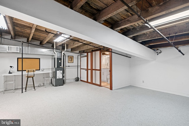 3132 E Thompson St Unit 2C, Philadelphia, PA 19134 - unfinished below grade area with heating unit and baseboards