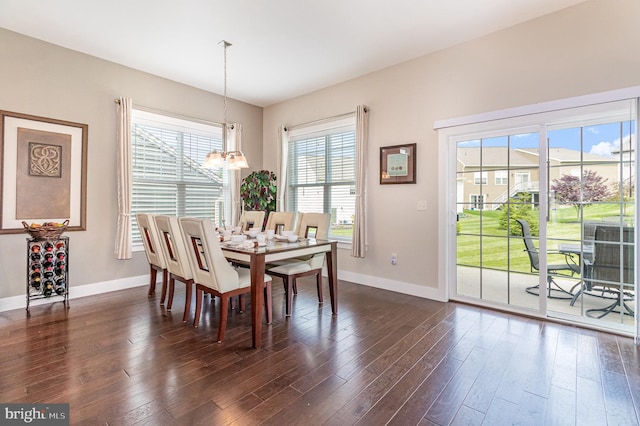 6039 Union Tunnel Dr, Harrisburg, PA 17111 - dining area featuring a chandelier, baseboards, and dark wood-style floors