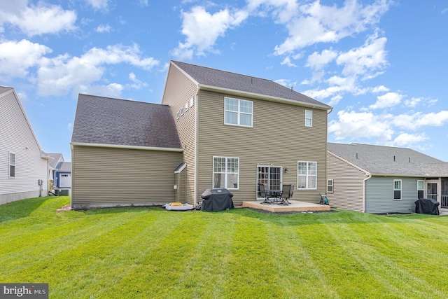 6039 Union Tunnel Dr, Harrisburg, PA 17111 - rear view of house with a patio area and a lawn