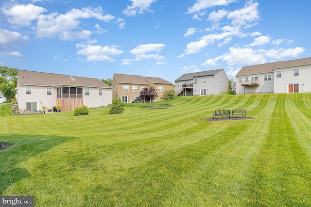 6039 Union Tunnel Dr, Harrisburg, PA 17111 - view of green lawn featuring a residential view and a sunroom