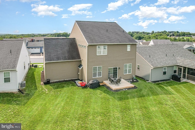 6039 Union Tunnel Dr, Harrisburg, PA 17111 - rear view of house with a lawn, a patio, a residential view, and roof with shingles