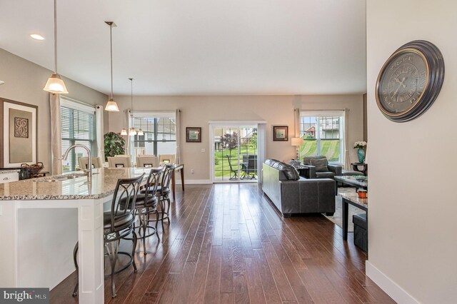 6039 Union Tunnel Dr, Harrisburg, PA 17111 - kitchen with dark wood-style flooring, healthy amount of natural light, and baseboards