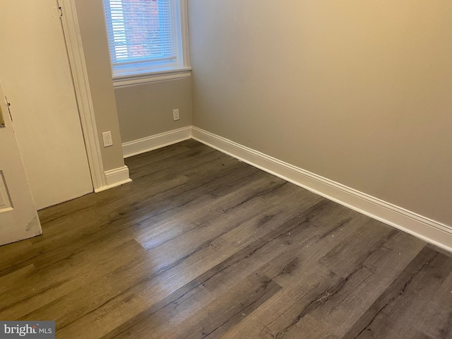 2333 W Firth St, Philadelphia, PA 19132 - unfurnished room with dark wood-style flooring and baseboards
