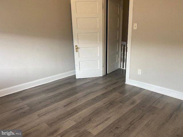 2333 W Firth St, Philadelphia, PA 19132 - unfurnished room featuring baseboards and dark wood-style floors