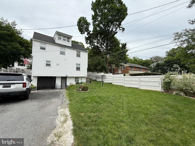 38 Park Rd, Reading, PA 19609 - view of front facade with driveway and a garage