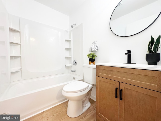 914 Townsend Blvd, Dover, DE 19901 - full bath featuring wood finished floors, toilet, vanity, and shower / bath combination