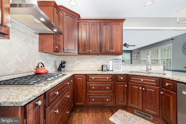 6202 Crofton Ct, Mechanicsburg, PA 17050 - kitchen with wall chimney exhaust hood, appliances with stainless steel finishes, a sink, light stone countertops, and dark wood-type flooring