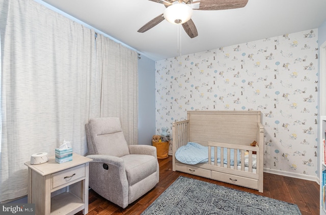 6202 Crofton Ct, Mechanicsburg, PA 17050 - bedroom with wallpapered walls, hardwood / wood-style flooring, a nursery area, baseboards, and a ceiling fan