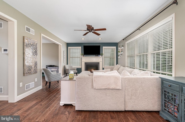 6202 Crofton Ct, Mechanicsburg, PA 17050 - living area with ceiling fan, plenty of natural light, a glass covered fireplace, dark wood-type flooring, and recessed lighting