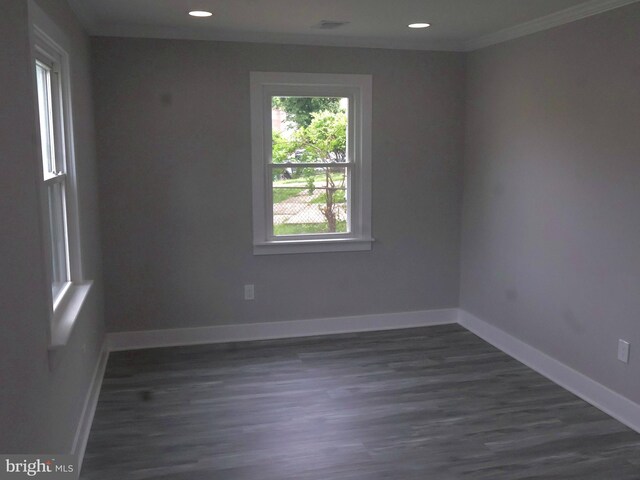 600 64th Ave, Capitol Heights, MD 20743 - unfurnished room with dark wood finished floors, baseboards, crown molding, and recessed lighting