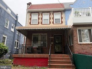 813 Sheridan St NW, Washington, DC 20011 - multi unit property with a porch, brick siding, and a balcony