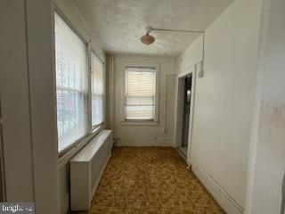 813 Sheridan St NW, Washington, DC 20011 - hallway with radiator
