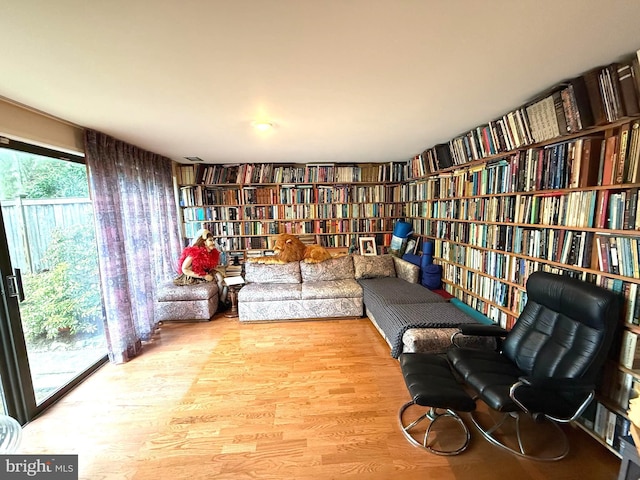 20 Willow St, Princeton, NJ 08540 - sitting room featuring bookshelves and wood finished floors
