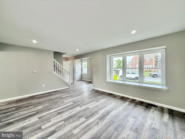 27 Chapel Cir, Sicklerville, NJ 08081 - unfurnished living room with baseboards, wood finished floors, recessed lighting, and stairs