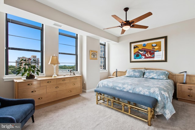 1830 Fountain Dr Unit 1107, Reston, VA 20190 - bedroom featuring light carpet and ceiling fan