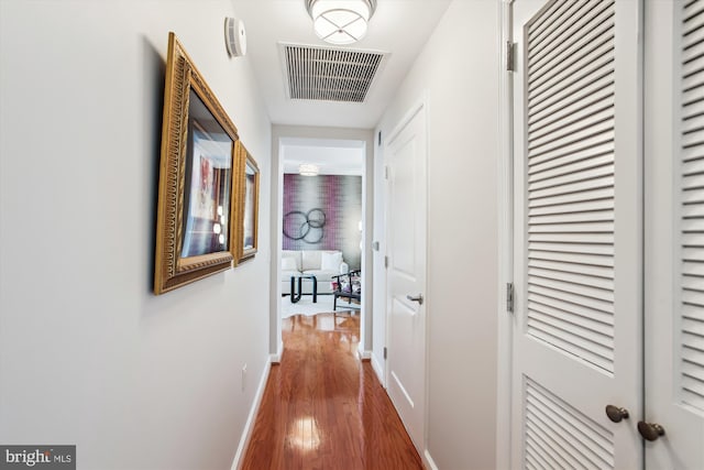 1830 Fountain Dr Unit 1107, Reston, VA 20190 - hall featuring wood finished floors and baseboards