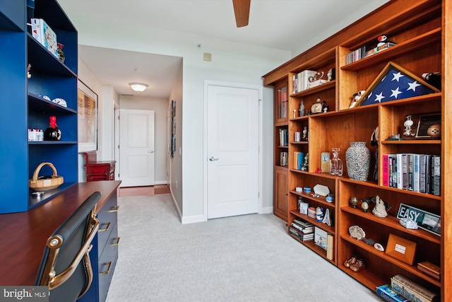 1830 Fountain Dr Unit 1107, Reston, VA 20190 - living area with carpet, a desk, and ceiling fan