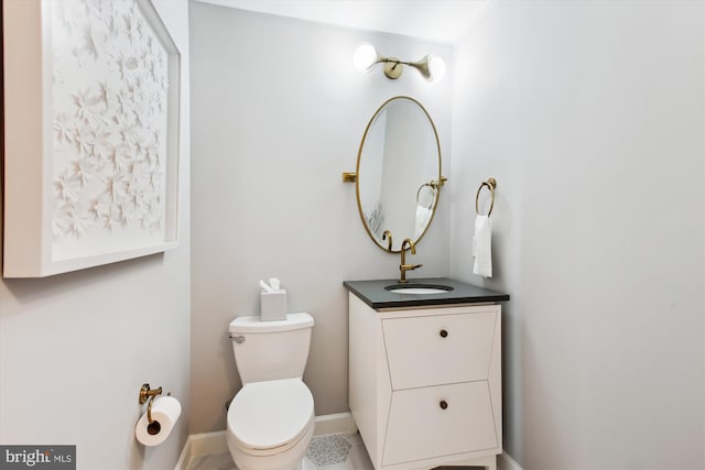 1830 Fountain Dr Unit 1107, Reston, VA 20190 - half bathroom featuring vanity and toilet