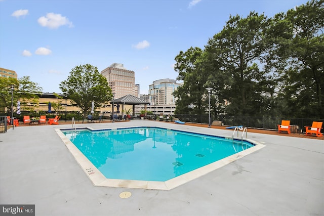 1830 Fountain Dr Unit 1107, Reston, VA 20190 - community pool with a gazebo and a patio